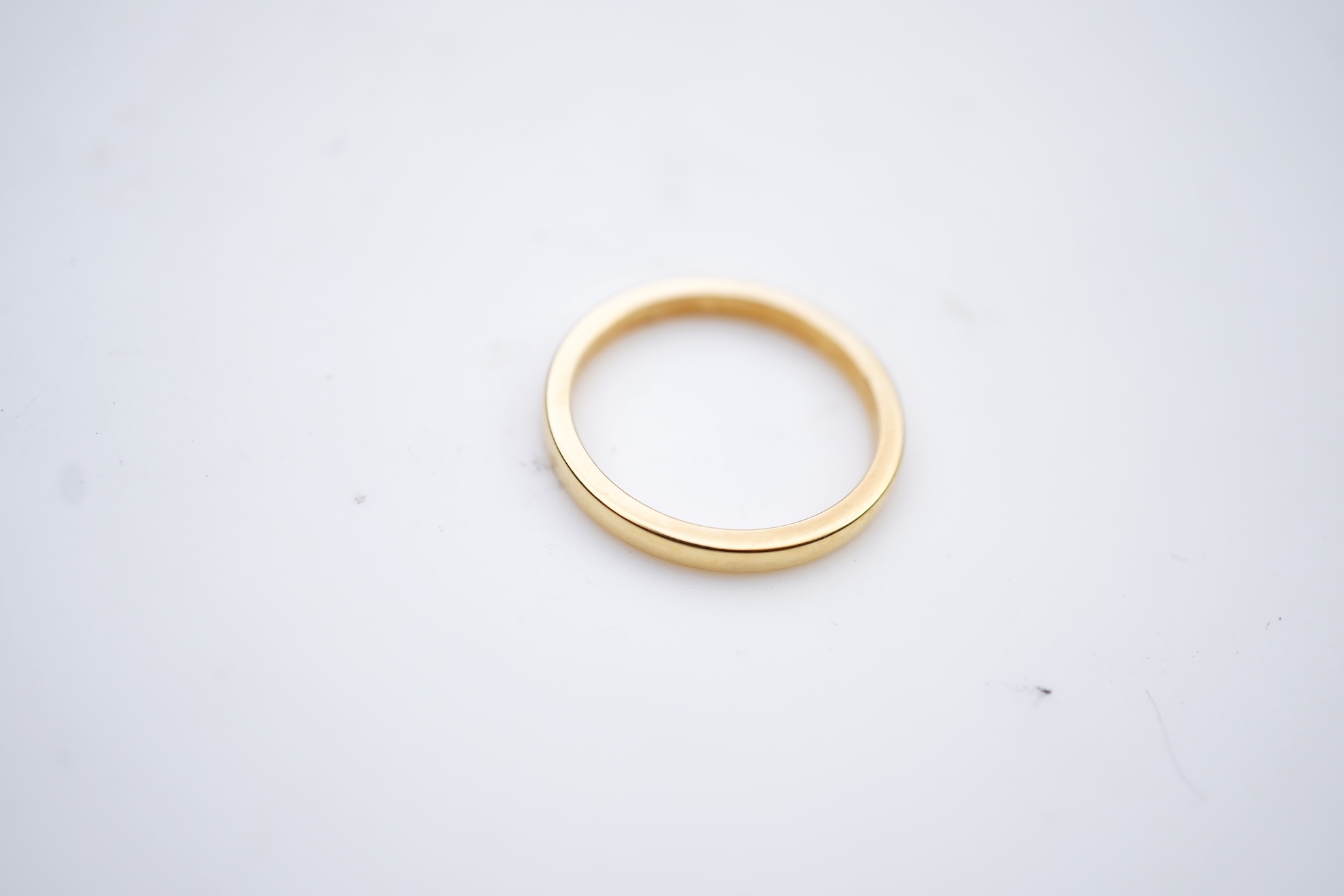 A collection of seven gold rings